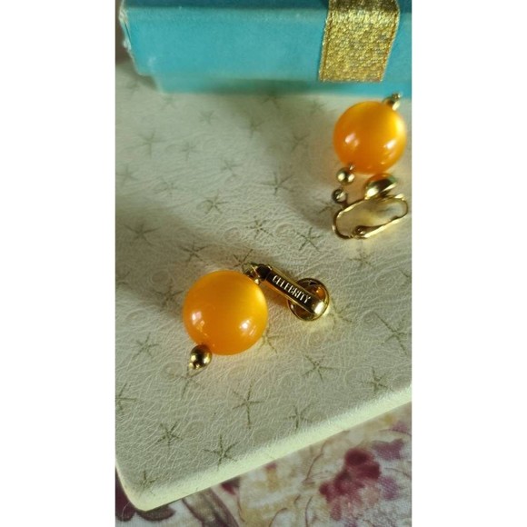 Celebrity Orange Dangling Clip-on Earrings - Picture 10 of 10